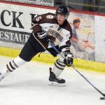 Kenai River Brown Bears defenseman Johan Bok moves the puck against the Chippewa Steel on Oct. 5, 2018, at the Soldotna Regional Sports Complex. (Photo by Jeff Helminiak/Peninsula Clarion)