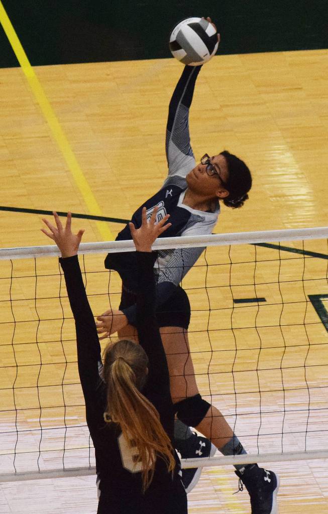 Soldotnas Serena Moore unleashes a shot against the Colony Knights, Friday afternoon at the Class 4A state volleyball tournament at the Alaska Airlines Center. (Photo by Joey Klecka/Peninsula Clarion)