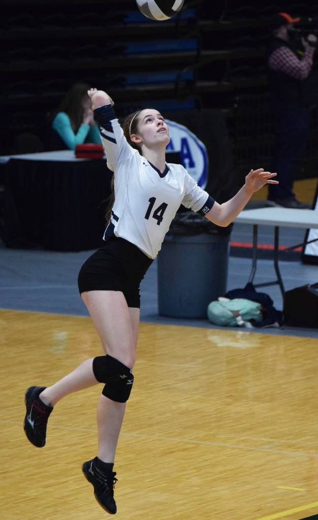 Homers Laura Inama unleashes a serve Friday against Barrow at the Class 3A state volleyball tournament at the Alaska Airlines Center. (Photo by Joey Klecka/Peninsula Clarion)