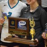 The Nikiski Bulldogs display the championship trophy Saturday after the Class 3A state volleyball final against Valdez at the Alaska Airlines Center. (Photo by Joey Klecka/Peninsula Clarion)