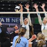 Nikiskis Kaitlyn Johnson (middle) and Bethany Carstens put up a block against Valdezs Ally Seiber (8) Saturday in the Class 3A state volleyball championship final at the Alaska Airlines Center. (Photo by Joey Klecka/Peninsula Clarion)