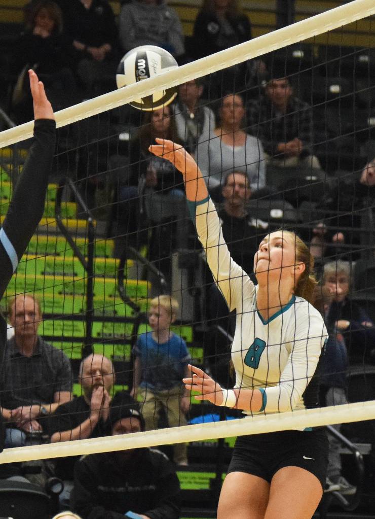 Nikiskis Kaitlyn Johnson directs the ball to Valdezs court Saturday in the Class 3A state volleyball championship final against Valdez at the Alaska Airlines Center. (Photo by Joey Klecka/Peninsula Clarion)