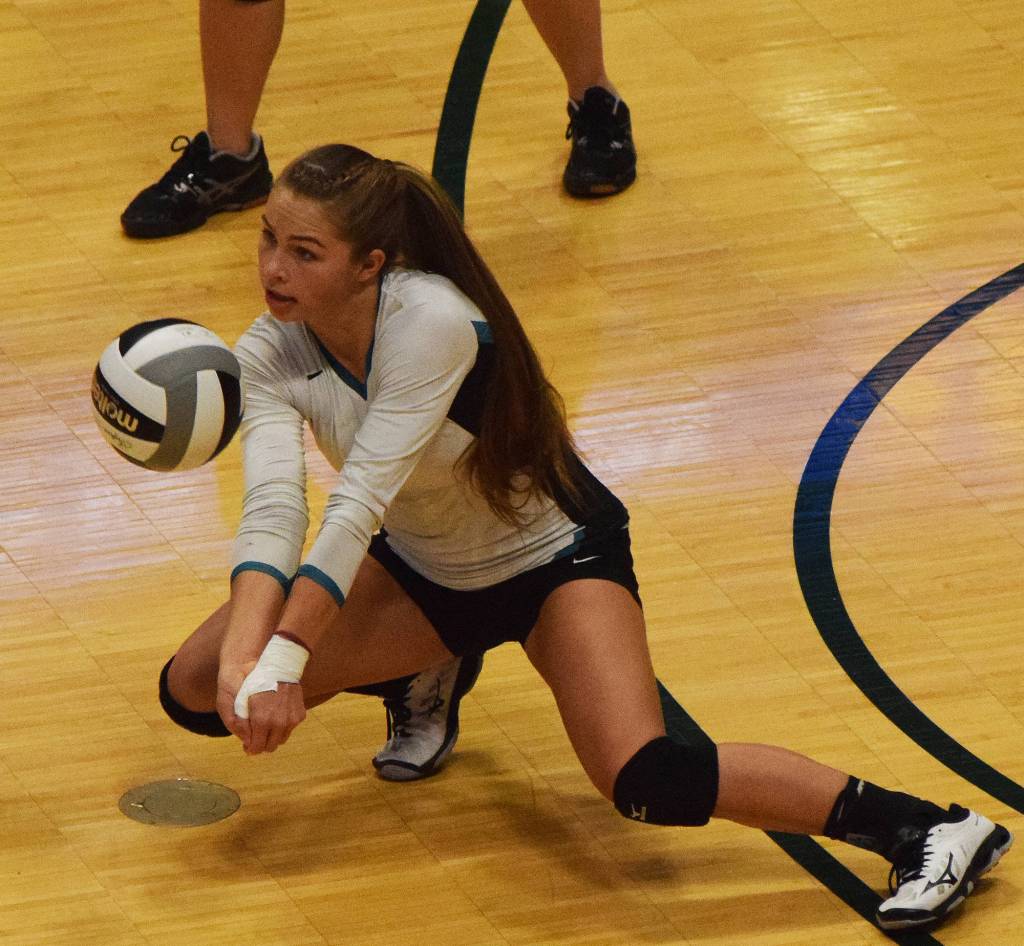Nikiskis Kaitlyn Johnson dives for a dig Saturday in the Class 3A state volleyball championship final against Valdez at the Alaska Airlines Center. (Photo by Joey Klecka/Peninsula Clarion)