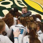 The Nikiski volleyball team celebrates after winning the Class 3A state volleyball championship final Saturday against Valdez at the Alaska Airlines Center. (Photo by Joey Klecka/Peninsula Clarion)