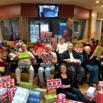 Heritage Place residents wrap holiday boxes with Samaritan’s Purse