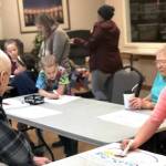Students work with Heritage Place residents to spread Thanksgiving cheer