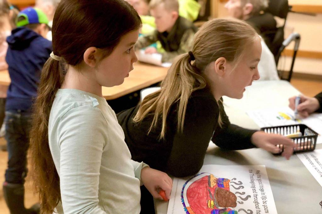 Students work with Heritage Place residents to spread Thanksgiving cheer