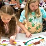 Students work with Heritage Place residents to spread Thanksgiving cheer