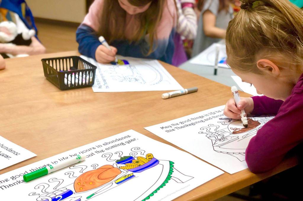 Students work with Heritage Place residents to spread Thanksgiving cheer