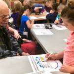 Students work with Heritage Place residents to spread Thanksgiving cheer