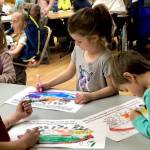 Students work with Heritage Place residents to spread Thanksgiving cheer
