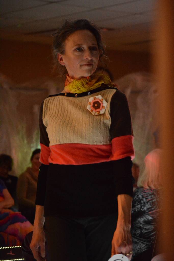 Adele Person models Lynn Burts Piece of the Pie and Gail Bakers Warmth silk scarf at the 2018 Wearable Arts on Nov. 17, 2018, in Homer, Alaska. (Photo by Michael Armstrong/Homer News)
