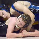 Soldotnas Saiyan Baker controls Nikiskis Chase Olsen on Tuesday, Nov. 20, 2018, at Nikiski High School. Olsen scored a 10-2 major decision. (Photo by Jeff Helminiak/Peninsula Clarion)