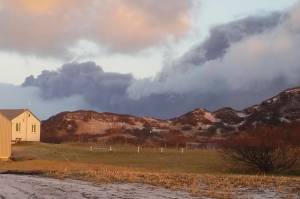 A black ash cloud from Alaskas Mount Veniaminof passes the community of Perryville, Alaska, on Wednesday, Nov. 21, 2018. Alaska Volcano Observatory scientists said the overnight ash emissions from Mount Veniaminof generated an ash plume that drifted more than 150 miles (241 kilometers) to the southeast. (Victoria Tague via AP)