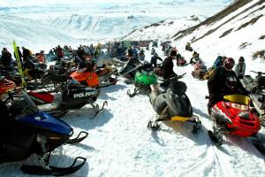 In this April 13, 2007, file photo, snowmachines gather around the finish chute during the 2007 Arctic Man Ski and Sno-Go Classic race in the HooDoo Mountains outside of Summit Lake, Alaska. (Eric Engman/Fairbanks Daily News-Miner via AP
