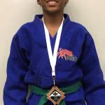 Gold medal winner Elijah Lee shows off his prize. (Photo submitted by Robert Brink)