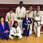 Kenai Peninsula judo fighters show off their medals. In front: Charles Fairbanks, Elijah Lee and unnamed competitor from another club; Back row: Liam Way, Maurice Green, Axel Coxwell and Stephanie Coxwell.(Photo submitted by Robert Brink)