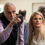 Alaska House District 1 candidate Republican Bart LeBon points to a vote tally board with his campaign manager Brittany Hartmann during a election recount at the Department of Elections Juneau office on Friday, Nov. 30, 2018. A single mystery ballot found on a precinct table on Election Day but not counted then could decide a tied Alaska state House race and thwart Republican efforts to control the chamber and all of state government. The ballot arrived in Juneau last Friday in a secrecy sleeve in a bin with other ballot materials. Officials were investigating its origins and handling before deciding whether to tally it. (Michael Penn/Juneau Empire via AP)