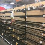 Empty shelves where bread is normally located are shown at a grocery store in Anchorage, Alaska, on Sunday, Dec. 2, 2018, two days after a magnitude 7.0 earthquake was centered about 7 miles north of the city. Anchorage officials urged residents not to stock up and hoard supplies because the supply chain of goods was not interrupted. (AP Photo/Mark Thiessen)