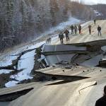In this Nov. 30, 2018 file photo, provided by Jonathan M. Lettow, people walk along Vine Road after an earthquake in Wasilla, Alaska. Alaska State Troopers are asking that people do not take selfies in front of the buckled roadway north of Anchorage, Alaska. (Jonathan M. Lettow via AP, File)