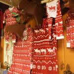 A variety of holiday designs adorn pajama wear hanging on the wall Tuesday afternoon at the Moose is Loose bakery in Soldotna. (Photo by Joey Klecka/Peninsula Clarion)