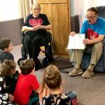 During Fridays Dignity Mission, residents of Heritage Place read to kindergartners from K-Beach Elementary, on Dec. 7, 2018, in Soldotna, Alaska. (Photo by Victoria Petersen)