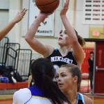 Nikiski senior Bethany Carstens goes up for a shot Thursday against Kotzebue at the Craig Jung Kenai River Challenge at Kenai Central High School. (Photo by Joey Klecka/Peninsula Clarion)