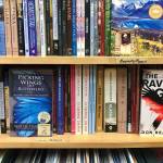 At River City Books, shoppers can easily find books written by local authors by perusing the local author shelf in the stores Alaska section, on Friday, Dec. 14, 2018, in Soldotna, Alaska. (Photo by Victoria Petersen/Peninsula Clarion)