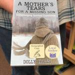 At River City Books, shoppers can easily find books written by local authors by searching for the stores local author sticker on the cover of the book, on Friday, Dec. 14, 2018, in Soldotna, Alaska. (Photo by Victoria Petersen/Peninsula Clarion)