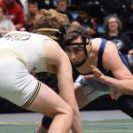 Soldotna senior Gideon Hutchison takes on Souths Jacob Shack in the 130-pound final Saturday night at the Div. I state wrestling championships at the Alaska Airlines Center in Anchorage. (Photo by Joey Klecka/Peninsula Clarion)
