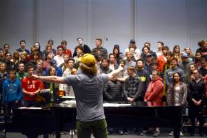 Simon Nissen organizes students in his choir class, grouping singers of similar vocals in the same section on December 15, 2017 at Kenai Central High School in Kenai, Alaska. (Photo by Kat Sorensen/Peninsula Clarion)                                Simon Nissen organizes students in his choir class, grouping singers of similar vocals in the same section on December 15, 2017 at Kenai Central High School in Kenai, Alaska. (Photo by Kat Sorensen/Peninsula Clarion)                                 Simon Nissen organizes students in his choir class, grouping singers of similar vocals in the same section on Dec. 15, 2017 at Kenai Central High School in Kenai, Alaska. (Photo by Kat Sorensen/Peninsula Clarion)