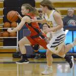 Kenai Centrals Hayley Maw dribbles against Homer on Friday, Dec. 21, 2018, in Homer, Alaska. (Photo by Michael Armstrong/Homer News)