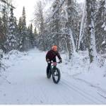 Tyle Owens rides to victory Sunday, Dec. 23, 2018, in Freezer Food Series Race 5, a six-mile fat bike race at the Slikok Trails outside of Soldotna. (Photo by Jeff Helminiak/Peninsula Clarion)