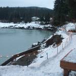 The view from the Staton residence on Meander Way shows the erosion caused by the Mendenhall River. The Statons are putting in a bank stabilization project after erosion has caused them to lose most of their backyard. They recently cut part of their deck off, seen in the lower right. (Alex McCarthy | Juneau Empire)