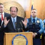 Alaska Attorney General Kevin Clarkson describes four new crimes bills at a press conference with Gov. Mike Dunleavy, left, and Alaska State Troopers at the Capitol on Wednesday, Jan. 23, 2019. (Michael Penn | Juneau Empire)