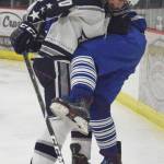 Soldotnas Braxton Urban and Palmers Alex Nelius battle for possession behind the Stars net Thursday at the Soldotna Regional Sports Complex. (Photo by Joey Klecka/Peninsula Clarion)