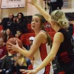 Kenais Brooke Satathite looks for an open teammate Saturday afternoon against the Houston Hawks at Kenai Central High School. (Photo by Joey Klecka/Peninsula Clarion)