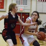 Kenais Logan Satathite dribbles to the arc against Houstons Katie Ritchie Saturday afternoon at Kenai Central High School. (Photo by Joey Klecka/Peninsula Clarion)