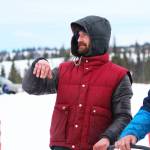 Nicolas Petit surveys the finish line of the Tustumena 200 Sled Dog Race just after coming in third place Sunday, Jan. 27, 2019 at Freddies Roadhouse in Ninilchik, Alaska. (Photo by Megan Pacer/Homer News)