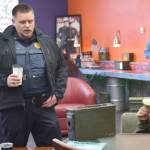 Kenai Police Chief David Ross answers questions from citizens at Ammo Can Coffee in Soldotna on Wednesday. (Photo by Brian Mazurek/Peninsula Clarion)