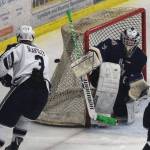 Homer goalie Hunter Warren fends off a shot by Soldotnas Galen Brantley III Jan. 15, 2019, at the Soldotna Regional Sports Complex. (Photo by Joey Klecka/Peninsula Clarion)