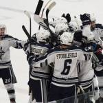 The Soldotna hockey team celebrates Galen Brantley IIIs game-winning goal in overtime over the Palmer Moose that clinched the top seed for SoHi in the upcoming Div. II state hockey tournament. (Photo by Joey Klecka/Peninsula Clarion)