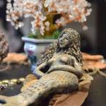 A mermaid carving sits on display at the Positive Vibe gallery in Kenai on Wednesday, Jan. 30, 2019. (Photo by Brian Mazurek/Peninsula Clarion)