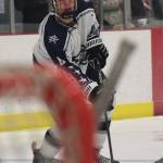 Soldotnas J.D. Schmelzenbach looks for an open shot Thursday against the Delta Huskies at the Div. II state hockey championship tournament in Wasilla. (Photo by Joey Klecka/Peninsula Clarion)