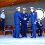 At a change of command ceremony on July 18, 2018 command of the USCGC Hickory is handed from Commander Andrew Passic (left) to Lt. Commander Adam Legget (second to right) at the Homer Boat House in Homer, Alaska. Overseeing the change of command is Capt. Patrick Hilbert (second to left) and Chaplain Lt. Gary Pepper (right). The ceremony took place in the new Homer Boat House at the Homer Harbor. (Photo by PO2 Andrew Keenan, Marine Safety Detachment Homer, United States Coast Guard)                                At a change of command ceremony on July 18, 2018 command of the USCGC Hickory is handed from Commander Andrew Passic (left) to Lt. Commander Adam Legget (second to right) at the Homer Boat House in Homer, Alaska. Overseeing the change of command is Capt. Patrick Hilbert (second to left) and Chaplain Lt. Gary Pepper (right). The ceremony took place in the new Homer Boat House at the Homer Harbor. (Photo by PO2 Andrew Keenan, Marine Safety Detachment Homer, United States Coast Guard)