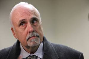 Republican Bart LeBon of Fairbanks listens to a reporters question after leaving the Alaska Supreme Court hearing room in Anchorage, Alaska, on Friday, Jan. 4, 2019, where justices heard arguments in a lawsuit disputing his one-vote victory in a state House race. His challenger, Democrat Kathryn Dodge, is challenging the results of a recount that determined LeBon won the open Fairbanks seat. (AP Photo/Mark Thiessen)