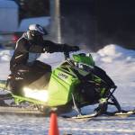 Richard Derkevorkian makes a pass in a heat race Saturday afternoon at the snowmachine drag races at Freddies Roadhouse near Ninilchik. (Photo by Joey Klecka/Peninsula Clarion)