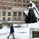 Snow coats the William Henry Seward statue outside of the Alaska State Capitol on Friday. (Angelo Saggiomo/Juneau Empire)