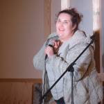 Kenai comedian Nikki Stein acts out talking to students during her routine at the Kenai Performers Theater on Thursday. (Photo by Brian Mazurek/Peninsula Clarion)