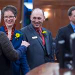Rep. Louise Stutes, R-Kodiak, left, congratulates Rep. Sarah Vance, R-Homer, Rep. Gary Knopp, R-Kenai, and Rep. Ben Carpenter, R-Nikiski, right, after being sworn in on the opening day of the 31st Session of the Alaska Legislature on Tuesday. (Michael Penn | Juneau Empire)